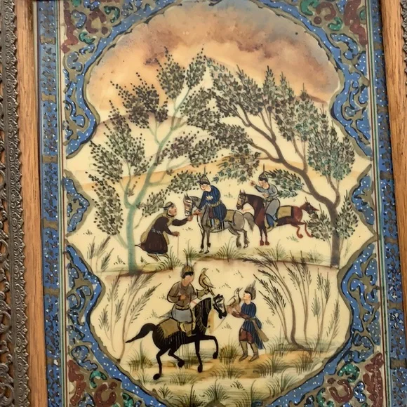 Hand painted on ivory? I am not an expert!! This is a very beautiful .